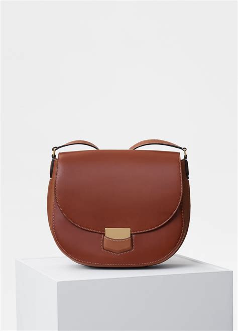 celine trotteur small vs compact|A Céline Favorite: The Trotteur Bag .